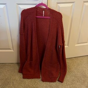 Free people dusty pink/ maroon cardigan sweater with pockets.